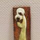 Slim relief with a motif of Madonna and child.