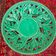 Openwork XL dish in green slurry like olive branches