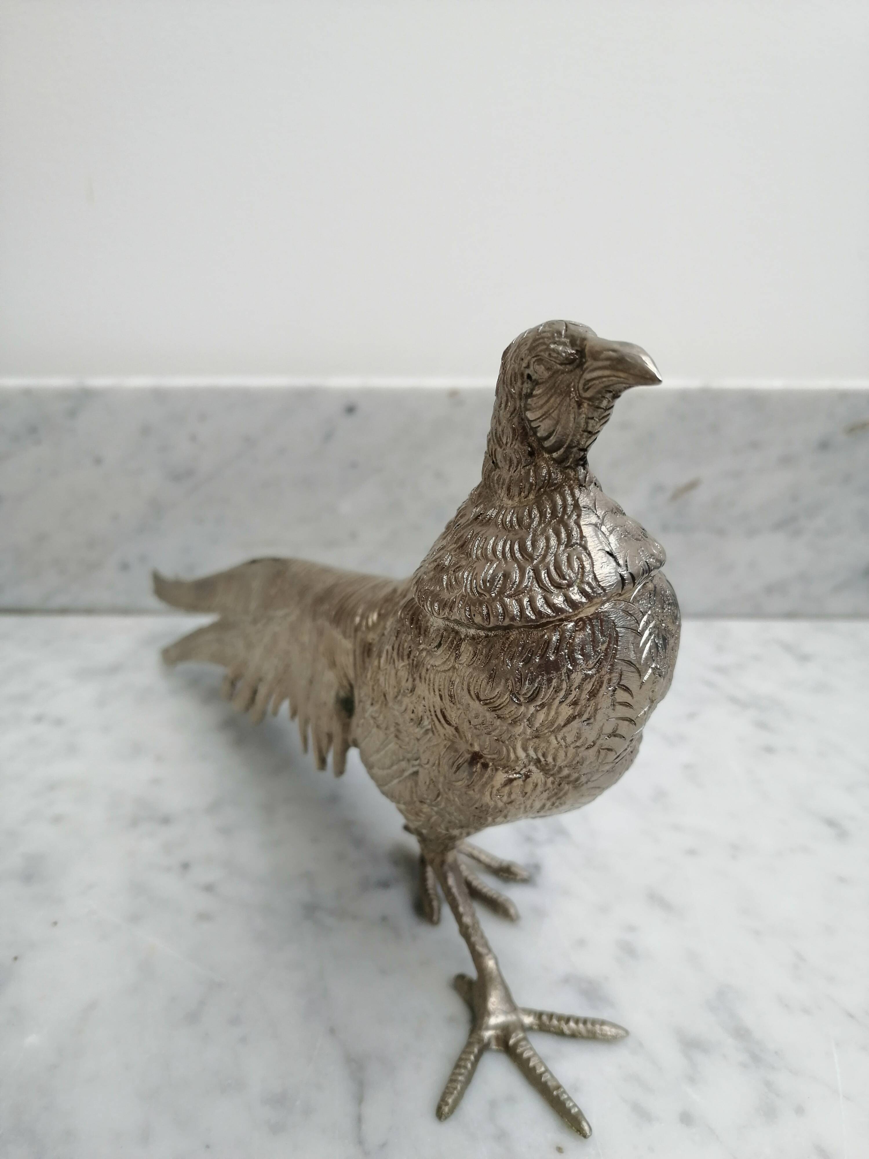 Couple of silver metal pheasants