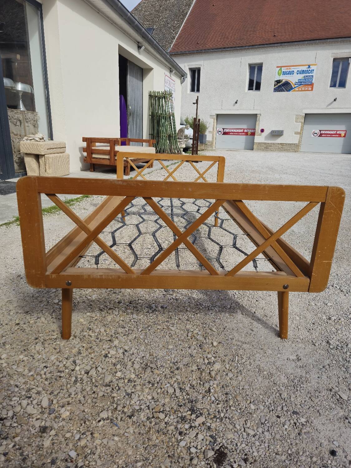 Vintage bed with compass feet from the 1950s