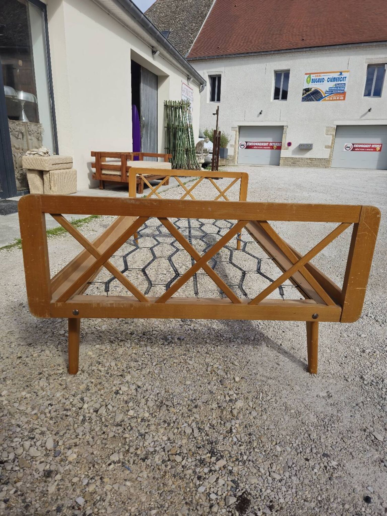 Vintage bed with compass feet from the 1950s