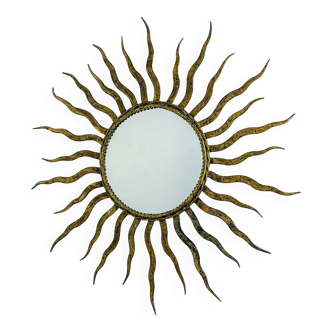 French sunburst starburst mirror in gilt iron, 1950s