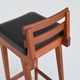 Erik Buck set of three bar stools in teak and leather Dyrlund Denmark 1960