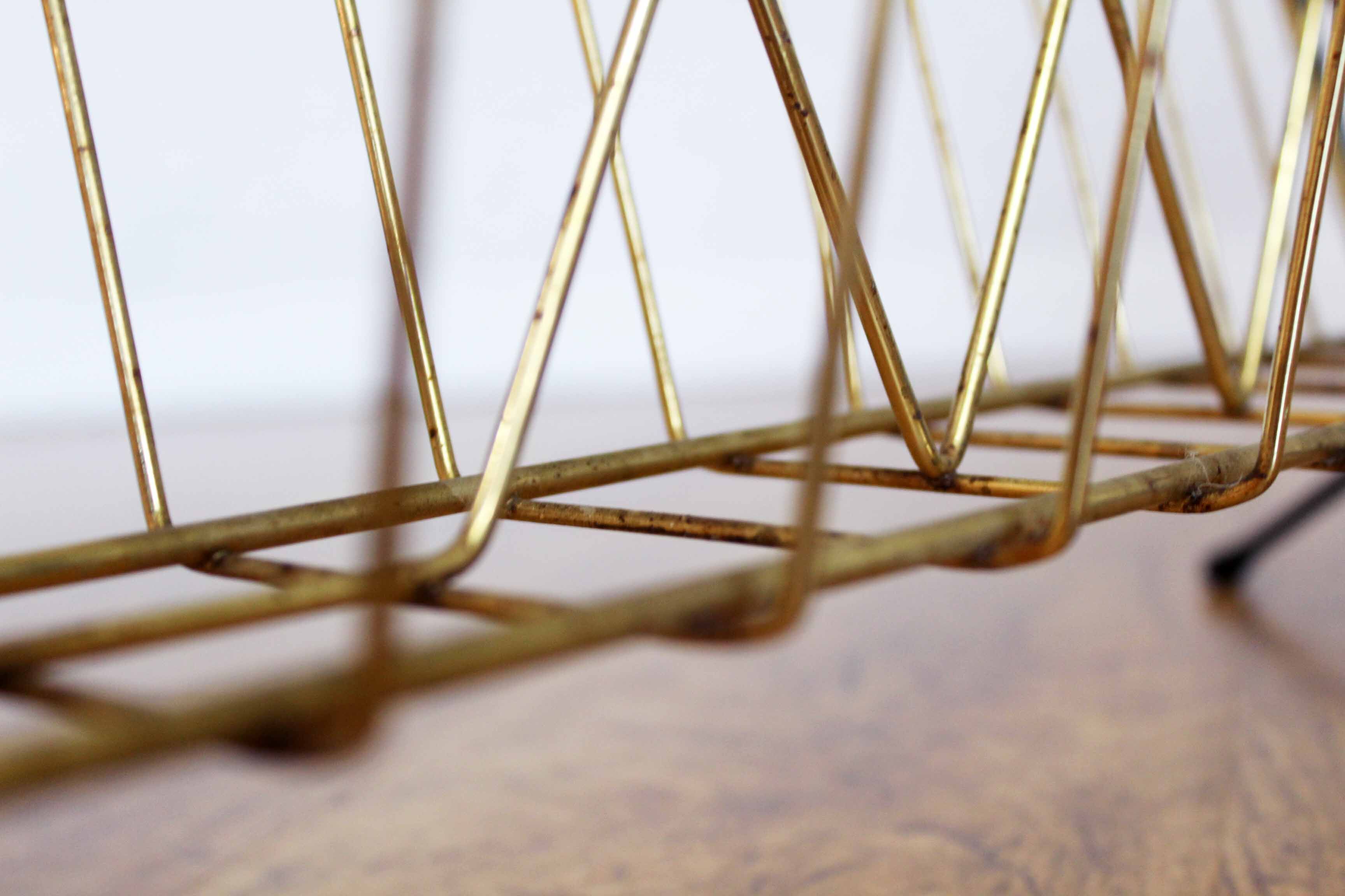 Metal magazine rack, wooden handle