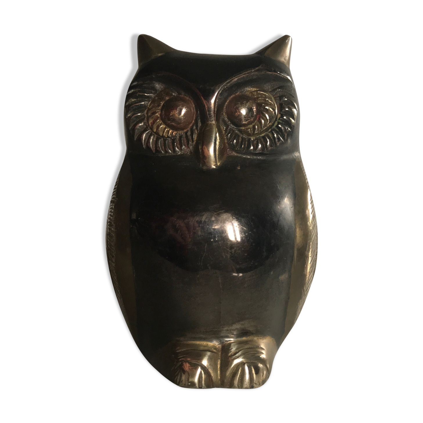Brass bicolor owl and gun barrel