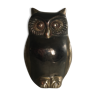 Brass bicolor owl and gun barrel