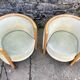 Pair of barrel-shaped armchairs in beech and almond green velvet by Maison Rosello