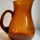 Ensemble composé d’un pichet et de 6 verres ambrés années 70