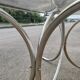 Vintage oval design table in smoked glass and chrome legs
