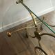 Neo classical style table in silver and gold metal and glass
