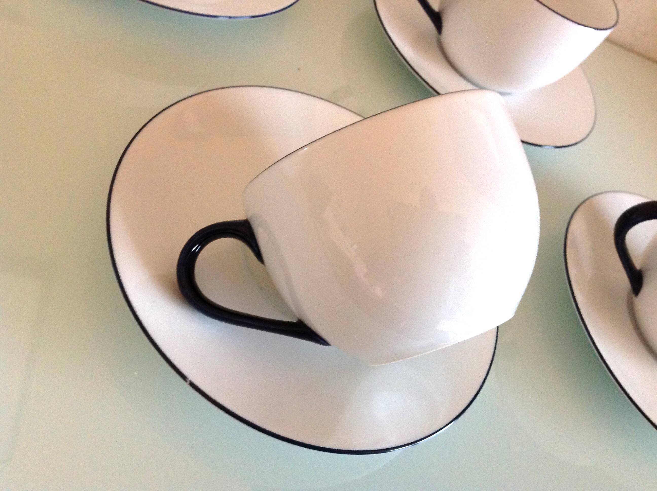 Set of eight white porcelain cups with blue edging / vintage 70s-80s