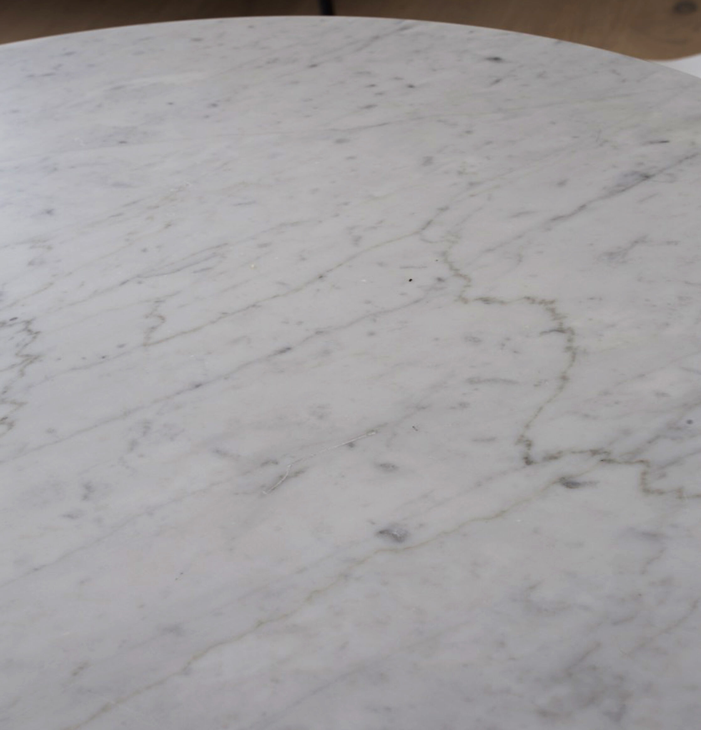 Coffee table in marble, wood and brass