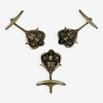 Trio of brass coat hooks