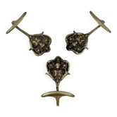 Trio of brass coat hooks