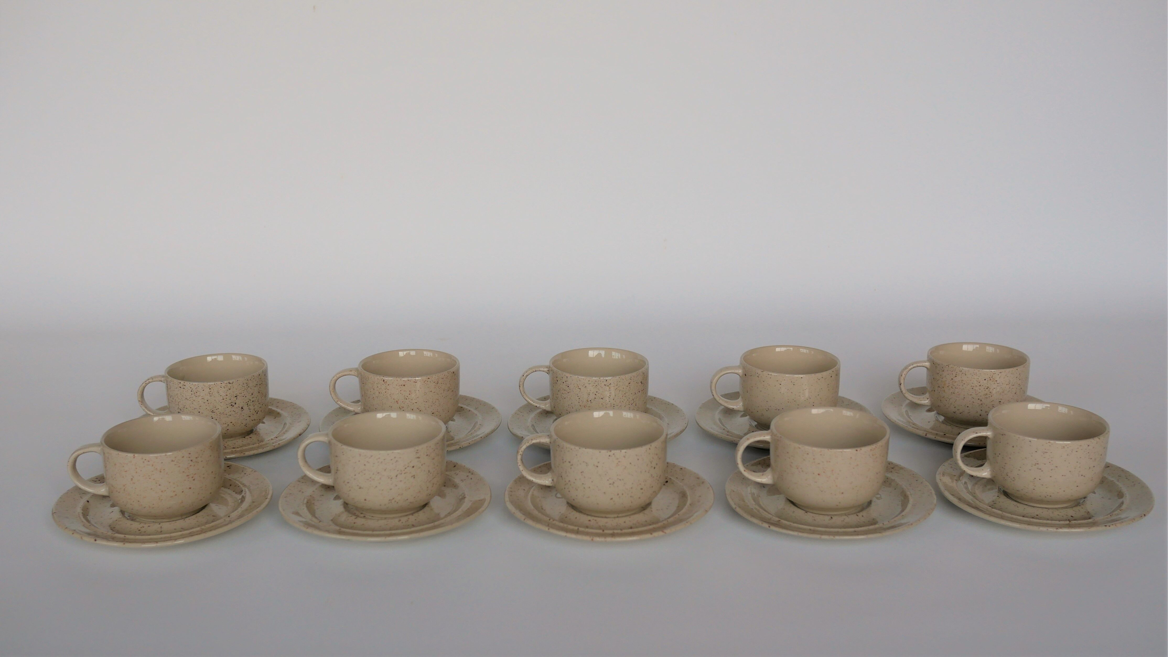 Coffee cup and vintage pyrity sandstone subcup