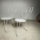 4 vintage wrought iron chairs