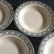 Set de 9 et 6 assiettes en faïence terre de fer de Salins début 20e décor gris vert