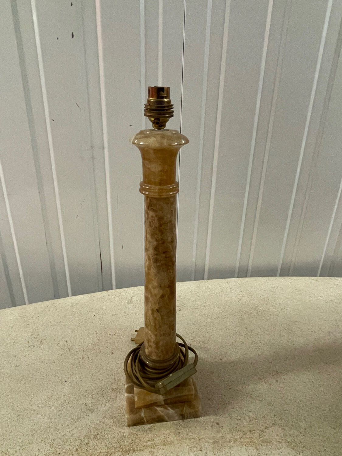Pair of candlesticks in yellow sienna marble