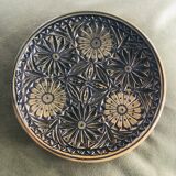 Small decorative chiseled ceramic plate