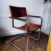 4 fauteuils cantilever Matteo Grassi en cuir cognac