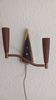 Mid-Century double Scandinavian wall lamp in teak and brass.