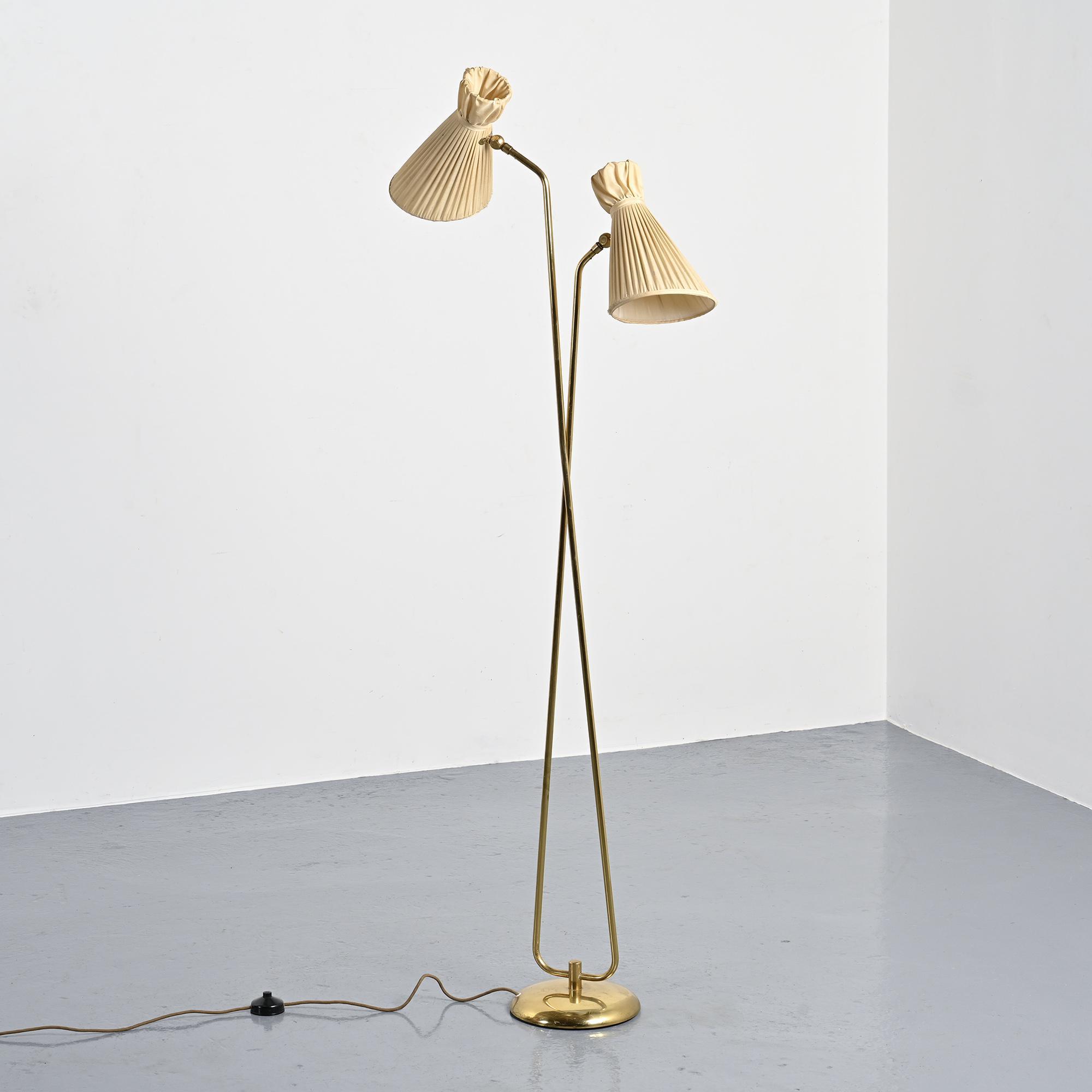 Two-arm adjustable floor lamp by BAG Turgi, Switzerland, 1950s.