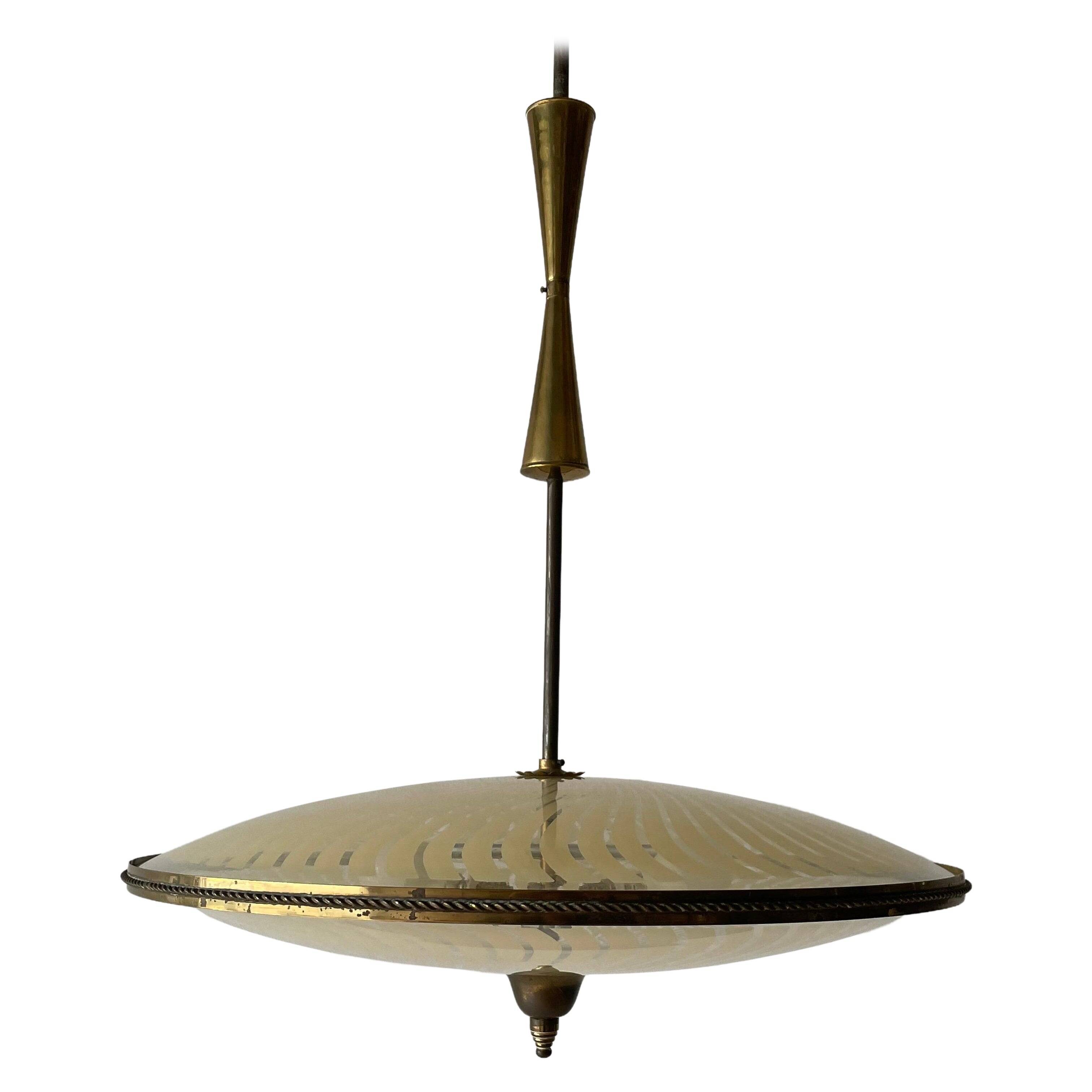 Large UFO design ceiling light in brass and printed glass, 1950s, Italy.