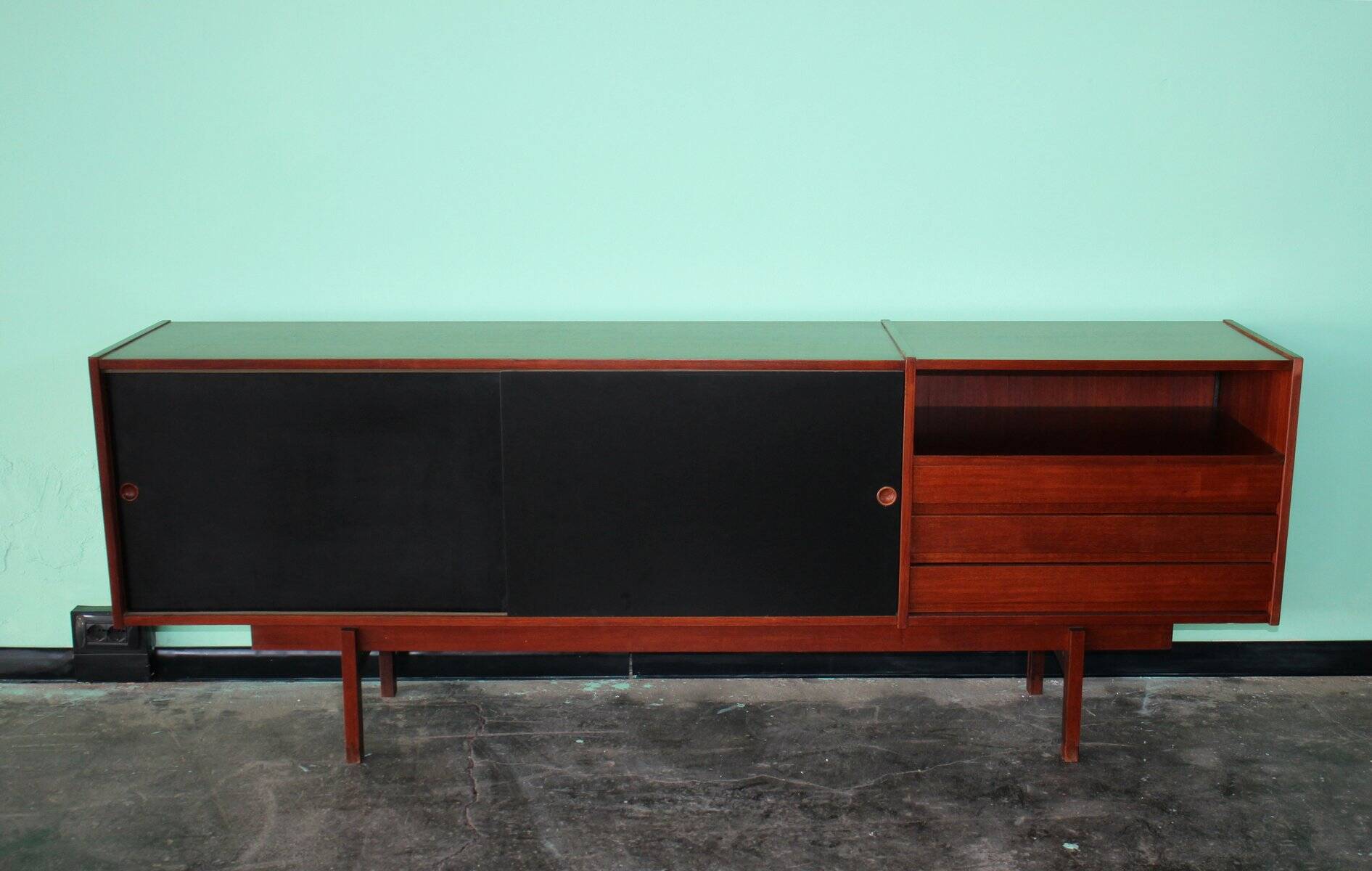 Enfilade or Mid-Century sideboard with sliding doors in black laminate by Saporiti Italia, Italy.
