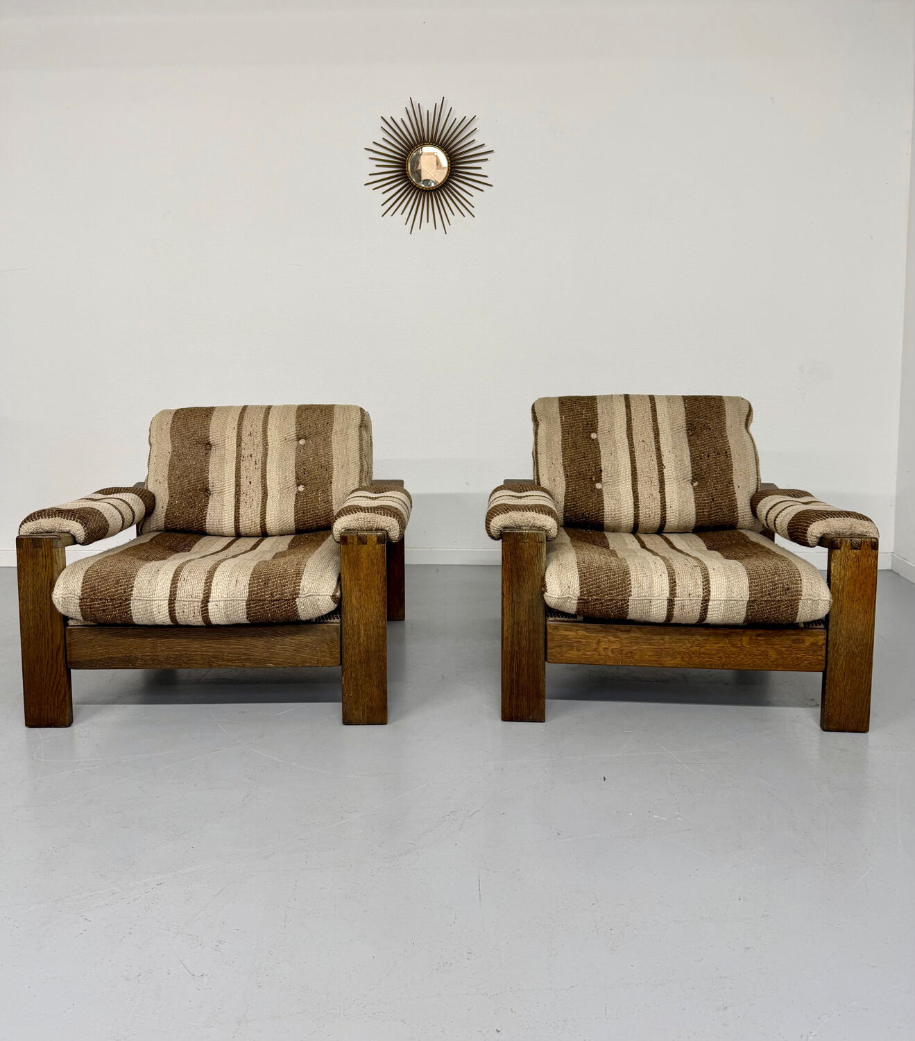 2 vintage 1970s wooden and fabric armchairs