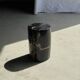 Small side table in black petrified wood with stripes and beige bottom H28.
