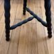 Tabouret tripode pieds bobines