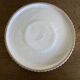 Pierre Motton glazed earthenware scalloped trivet for Gien