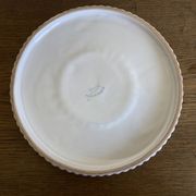 Pierre Motton glazed earthenware scalloped trivet for Gien