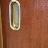 Vintage shoe cabinet with compass legs