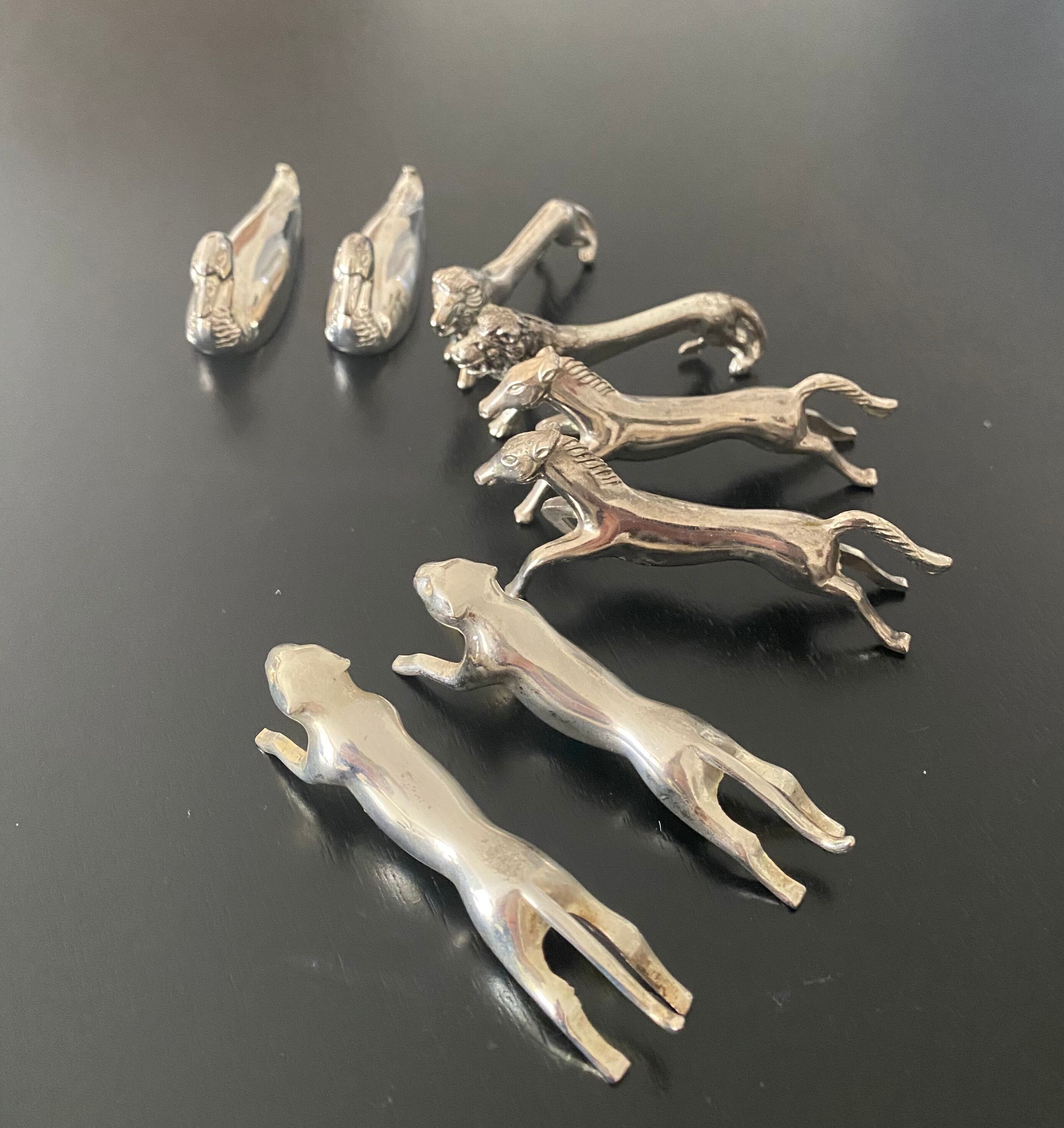 8 metal knife holders, animal