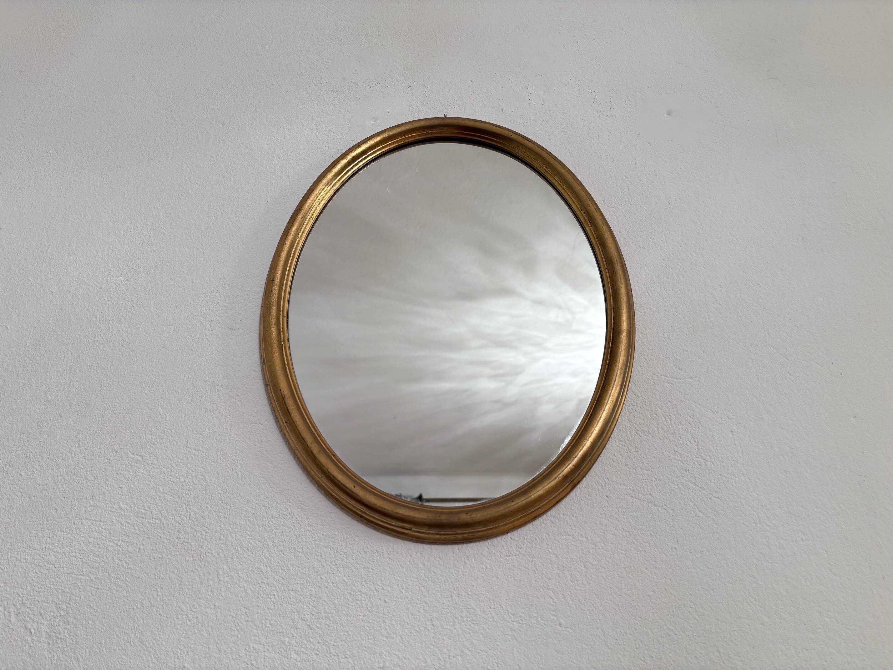 Mirror in a gilded wooden frame, Germany, 1960s