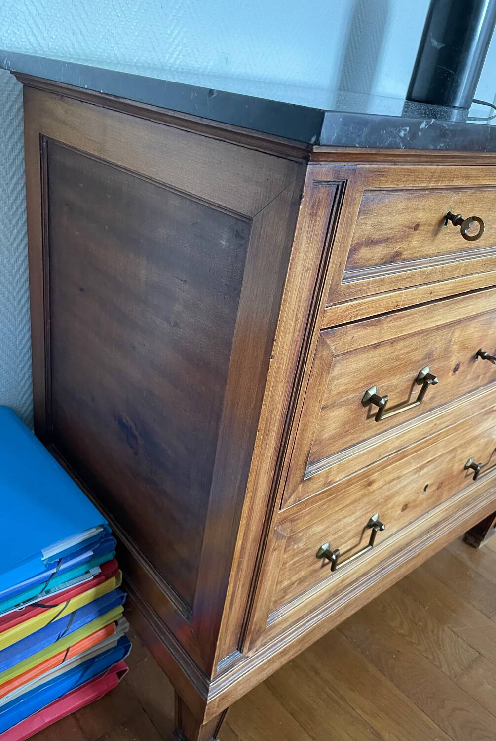 Antique wooden order with black marble top