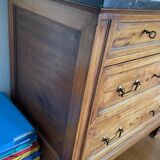 Antique wooden order with black marble top