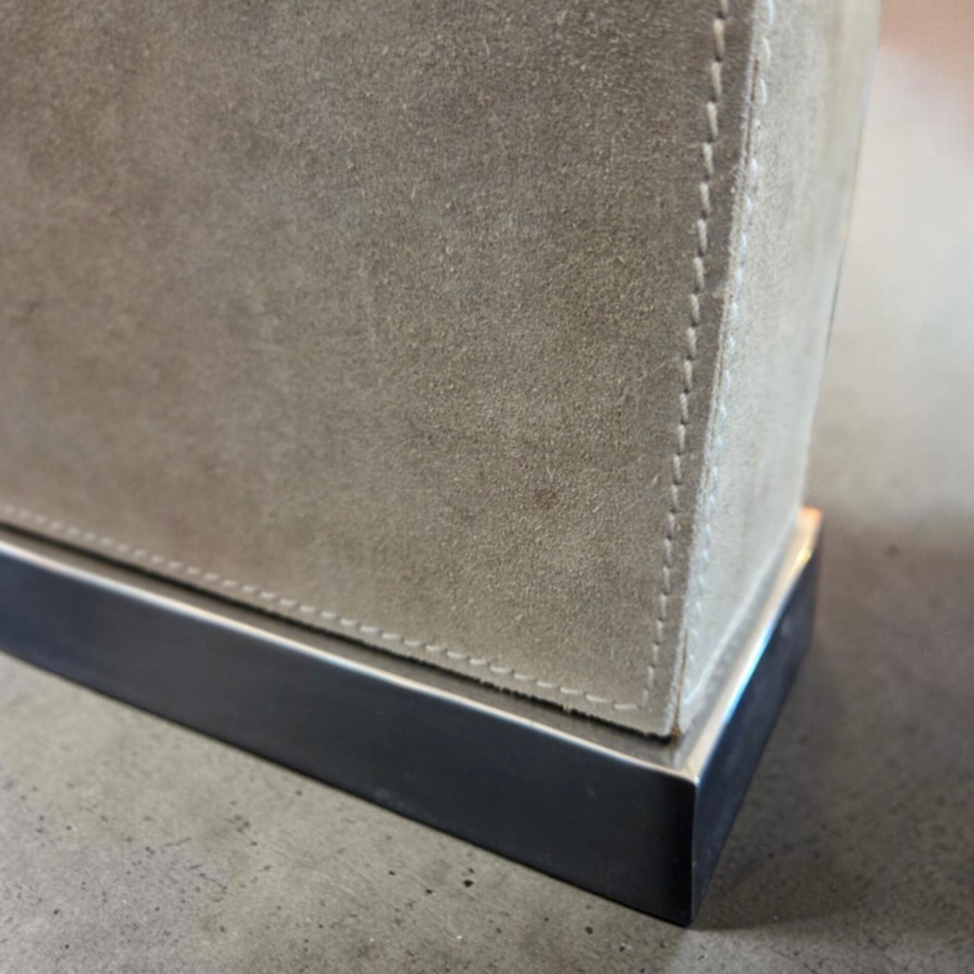Stainless steel and suede lamp