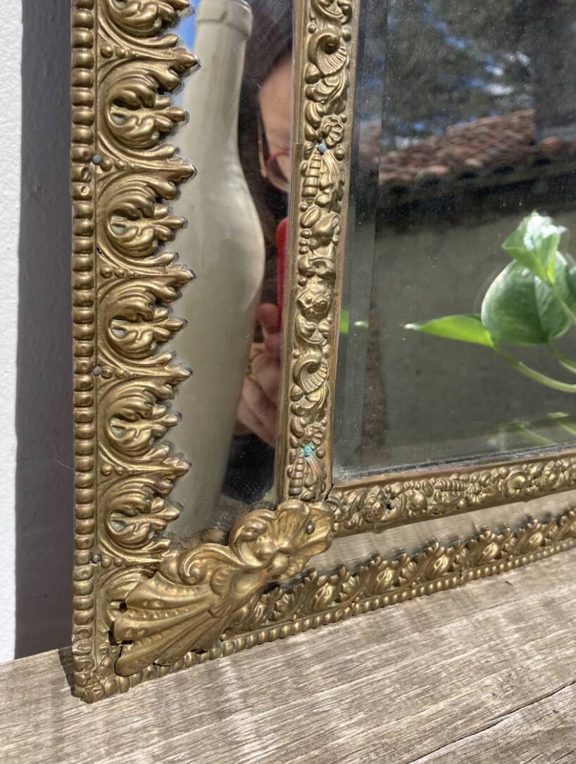 Golden mirror with 19th century embossed brass beads