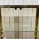 Exhibition showcase in gold-plated chrome and smoked glass - work from the 1980s.