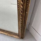 Louis XVI style mirror in wood and gilded stucco, 19th century