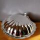 Shell-shaped butter dish in stainless steel