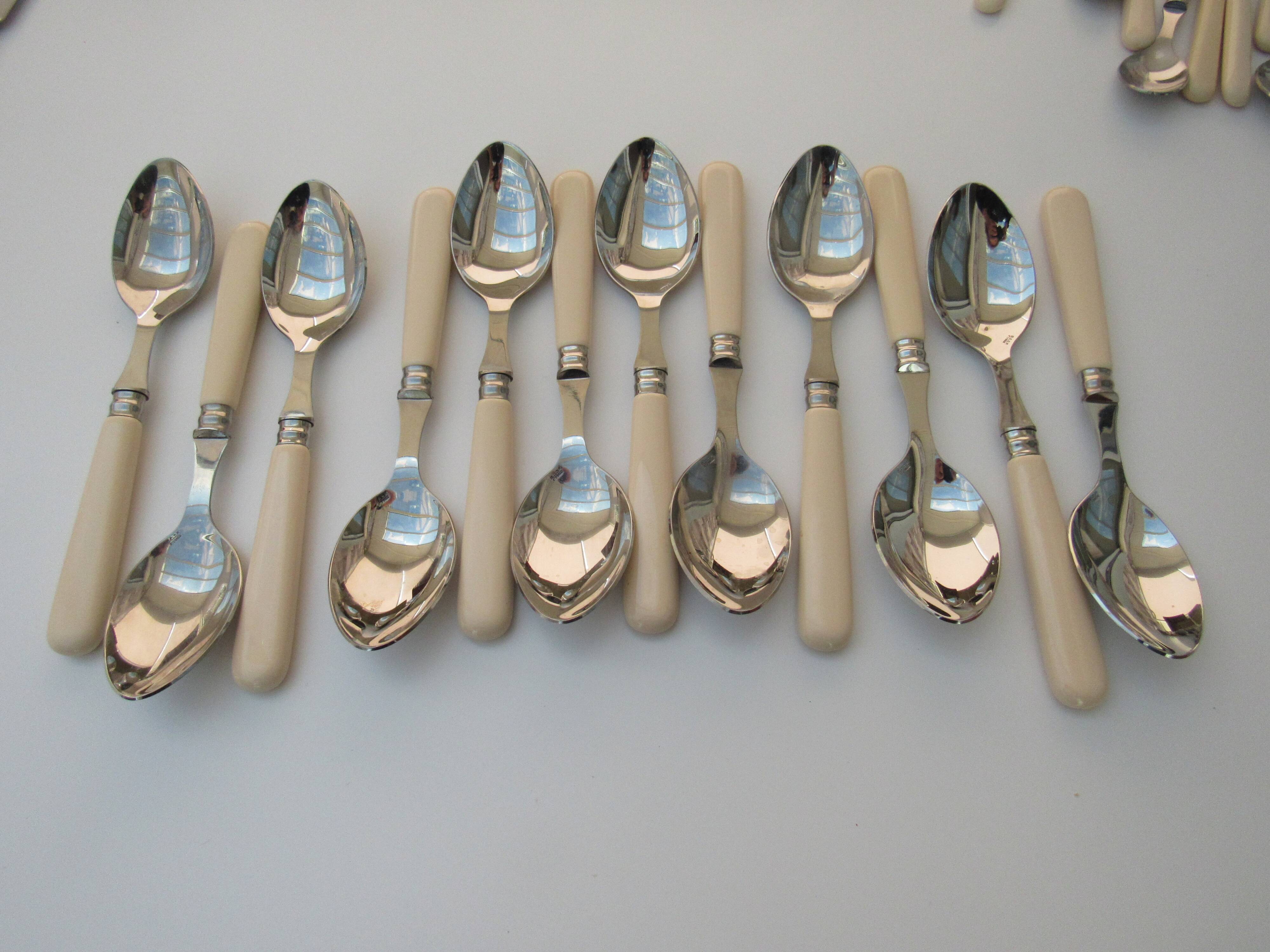 Set of 46 Cambridge ivory cutlery Scof France