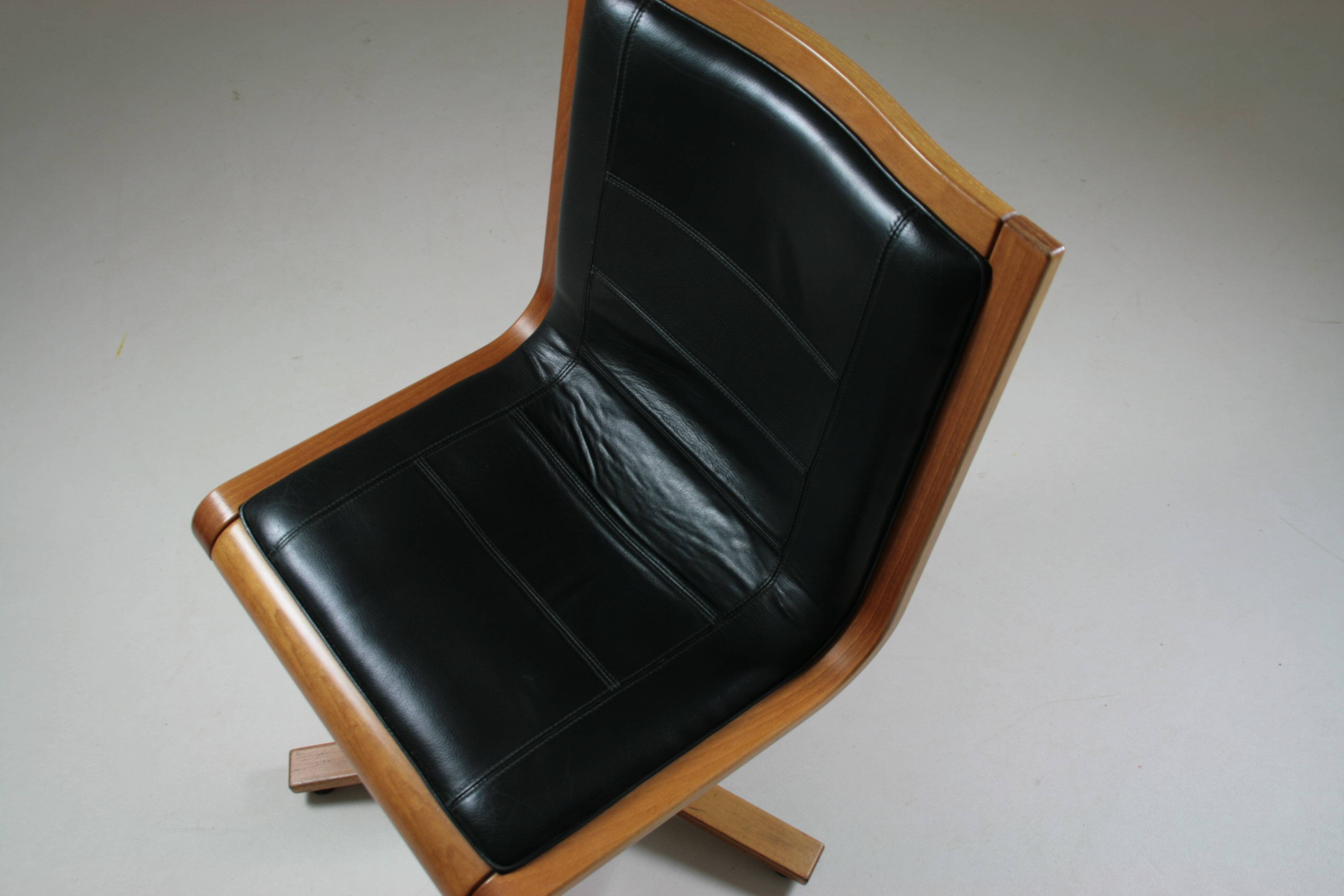 Office armchair in beech and black leather for Cofemo, Italy