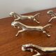 Set of 6 vintage galloping horse knife rests in silver-plated metal.