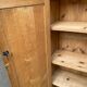 Parisian bonnetière cabinet, stripped display in solid oak from the 1930s.