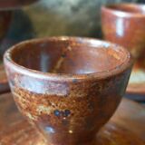 Four pyrite stoneware shells