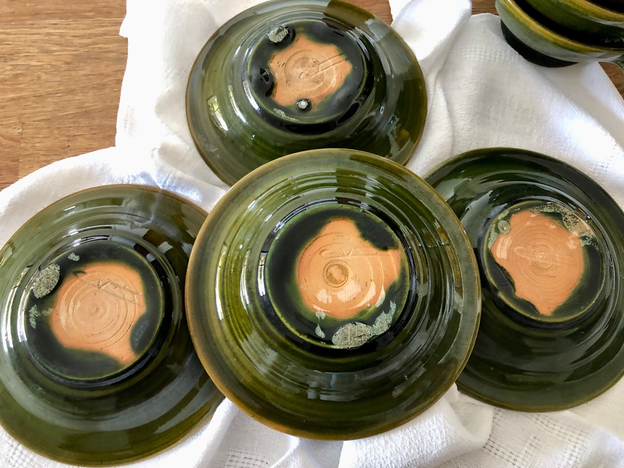 4 signed cup, cup and saucer sets