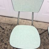 4 green formica chairs